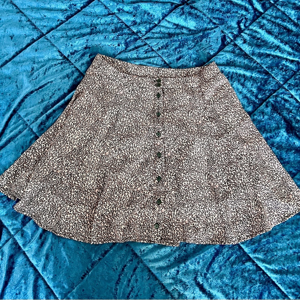 Light pink leopard mini skirt